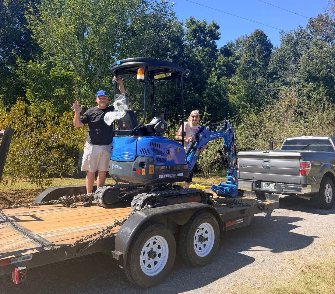Ken B. and his wife with their new RIPPA R15 mini excavator loaded for the trip home to Florida from Ironcrest Equipment in Cullman, Alabama.